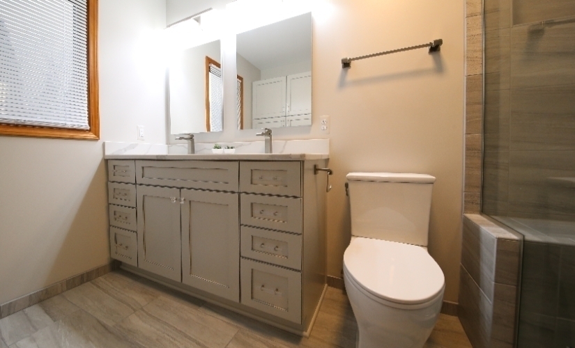 This bathroom located in Saline uses DalTile,Delta,Sherwin Williams